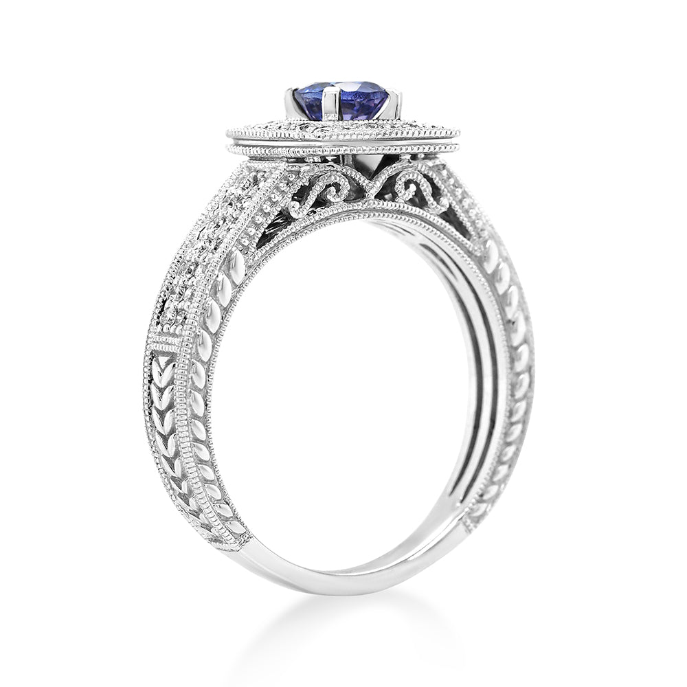 18ct White Gold Tanzanite & Diamond Halo Dress Ring TDW: 0.3