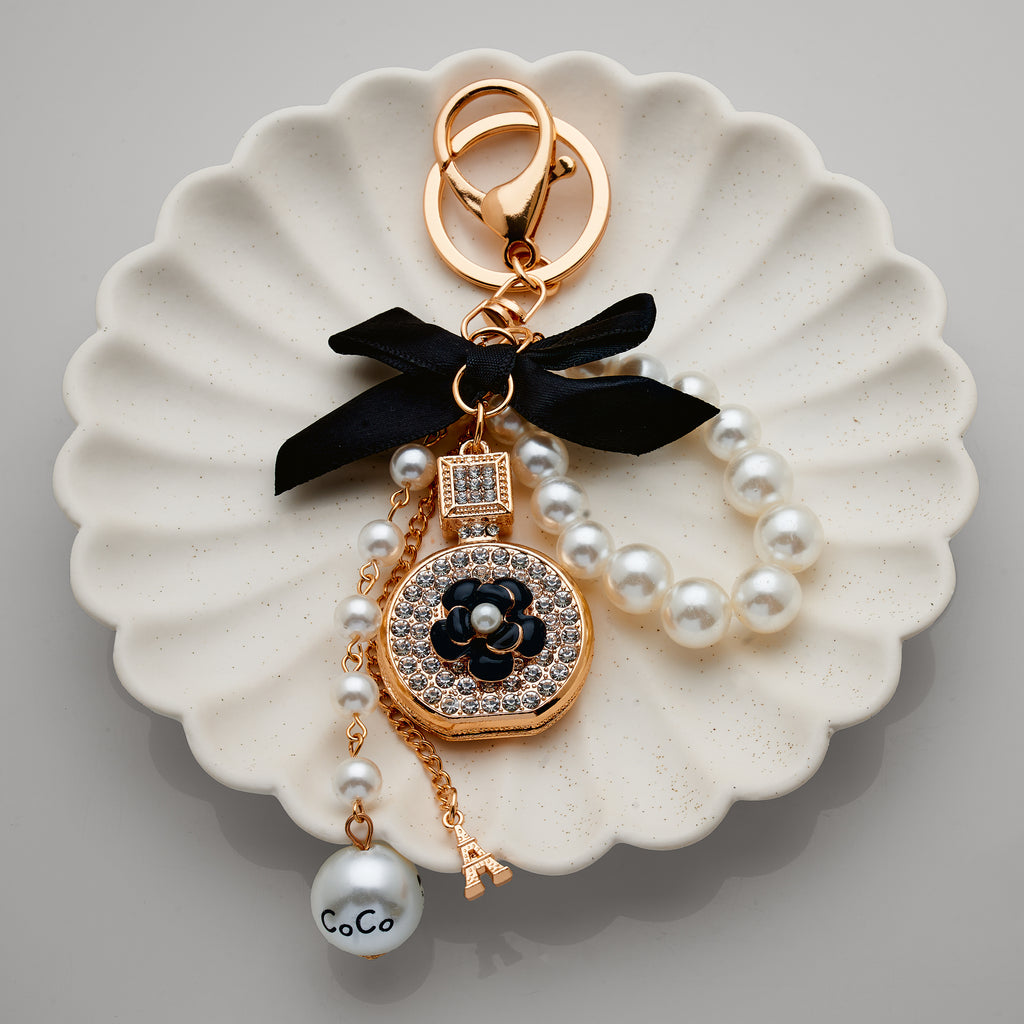 Gold Tone Crystal Perfume Bottle With Pearls & Black Bow Key