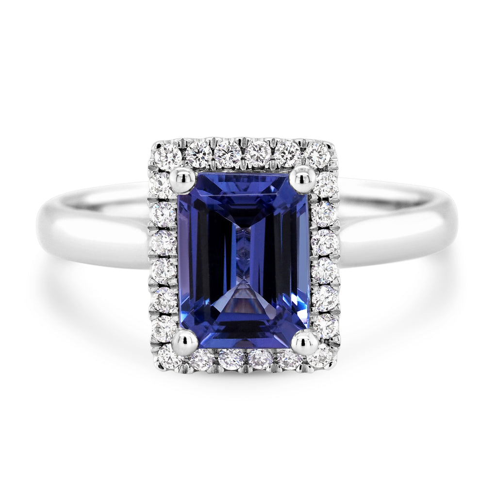 18ct White Gold Emerald Cut Tanzanite & Diamond Halo Ring TD